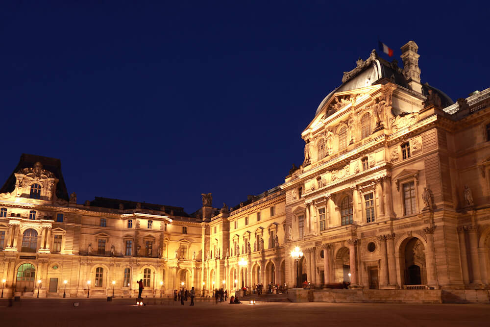 The louvre museum at night